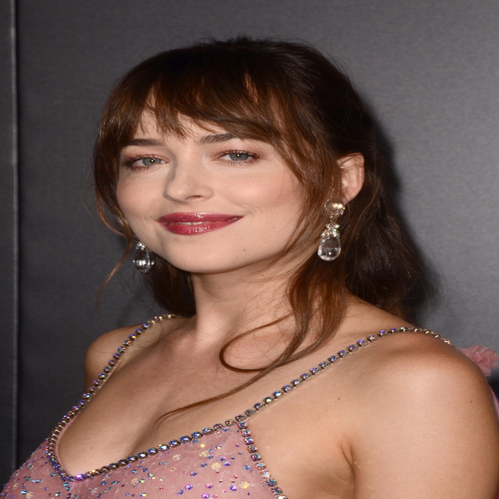 Dakota Johnson a top Female celebrity from United States read their Biography and see, their social profiles and what designer brand clothing they have been seen wearing.